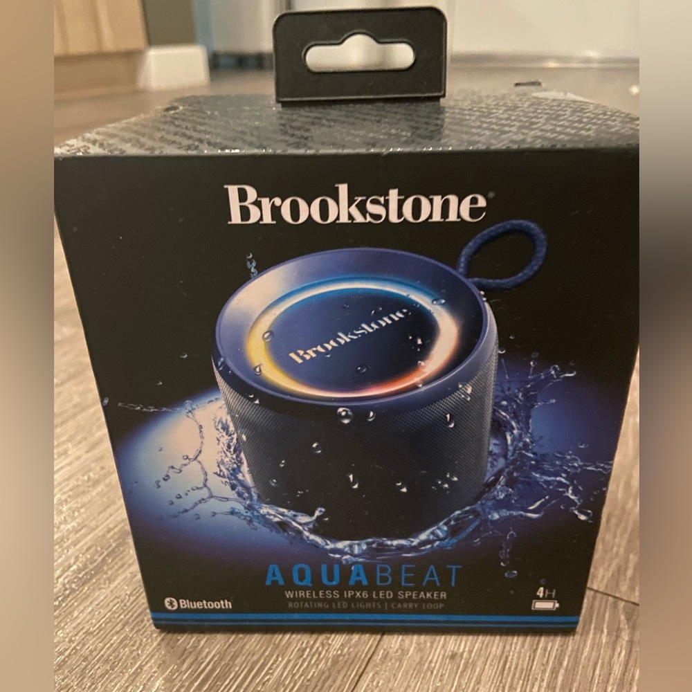 Brookstone Aquabeat wireless Ipx6 led speaker